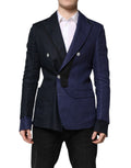 Veste blazer bleue marine Dolce & Gabbana à double boutonnage, tissu élégant et coupe ajustée pour homme.