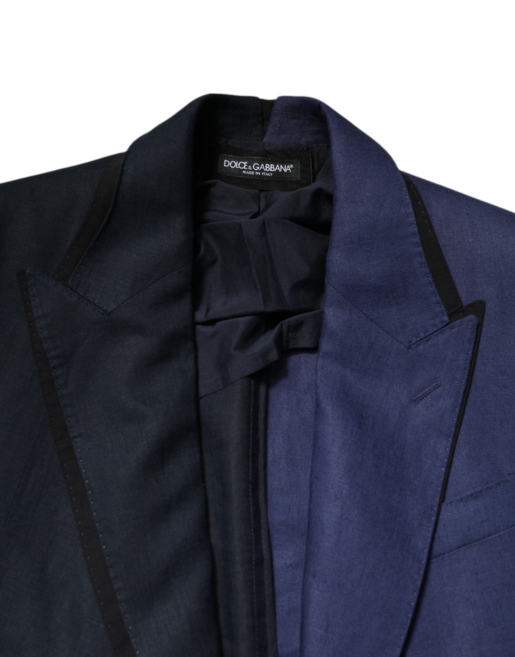 Manteau blazer bleu marine à double boutonnage Dolce & Gabbana, veste élégante en tissu fin, vue de face avec détails de couture.