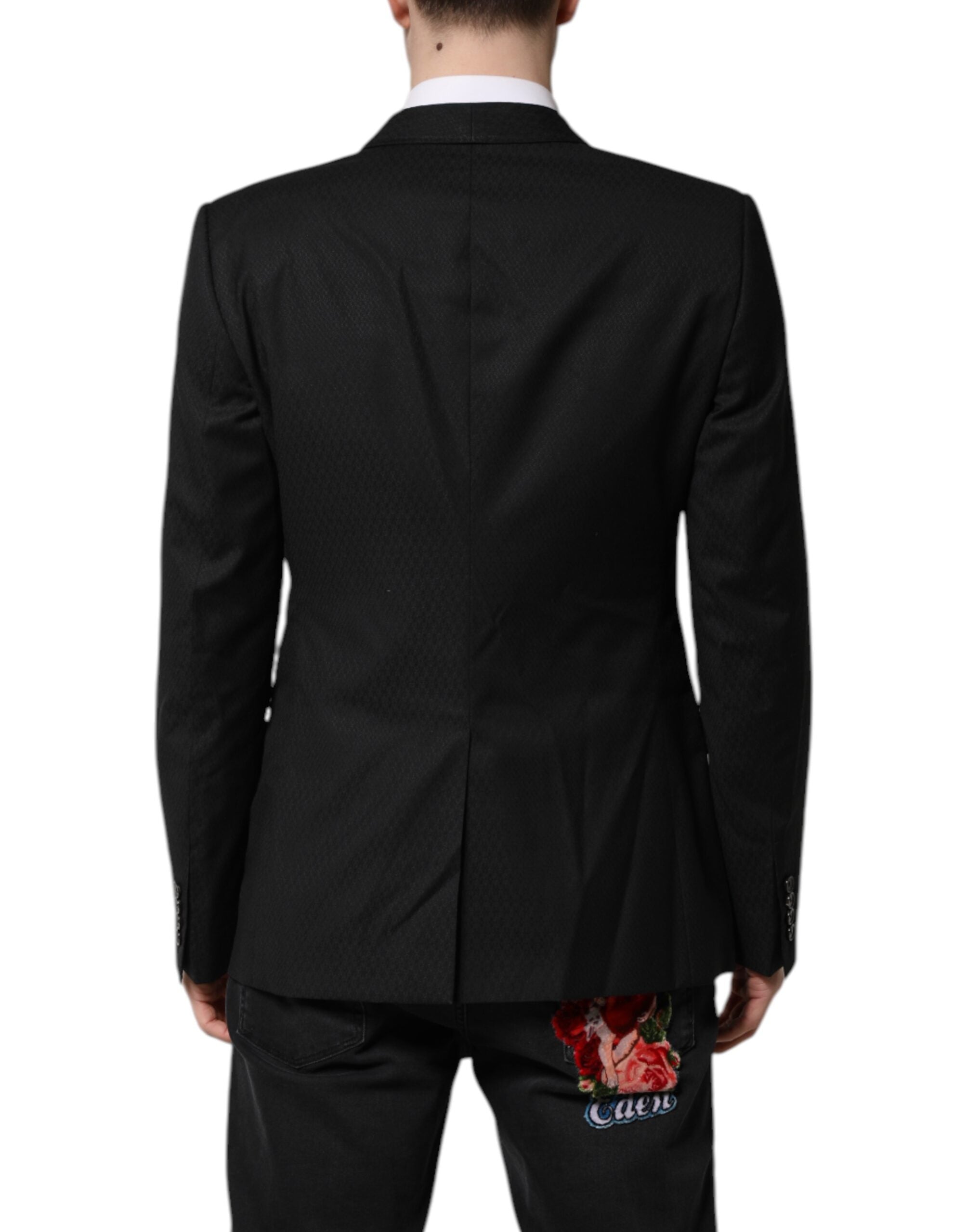 Veste blazer noire Dolce & Gabbana à boutonnière simple, ornementations dorées, coupe élégante et tissu raffiné.