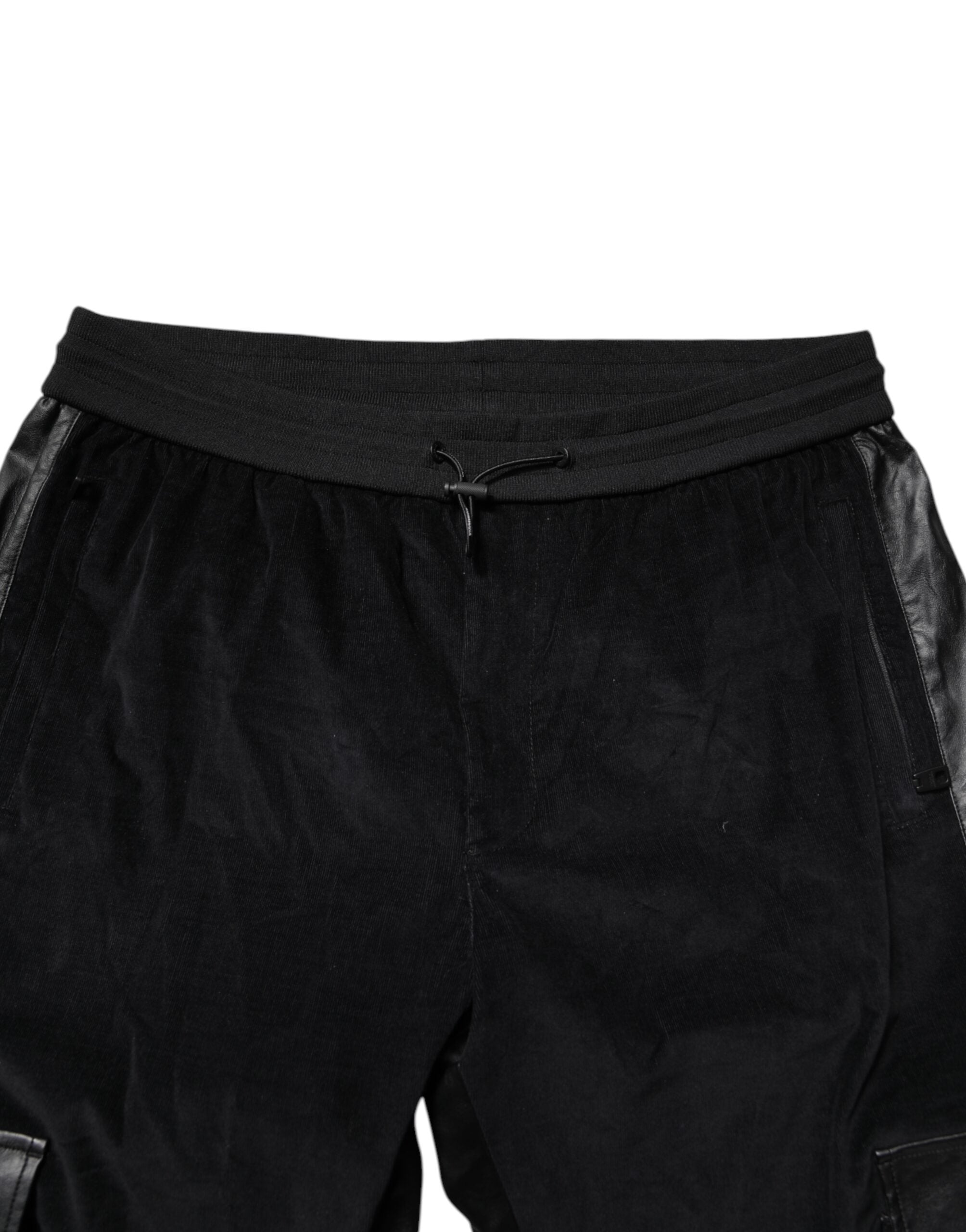 Pantalons de jogging cargo en coton noir Dolce & Gabbana, coupe décontractée, avec poches latérales et détails modernes.