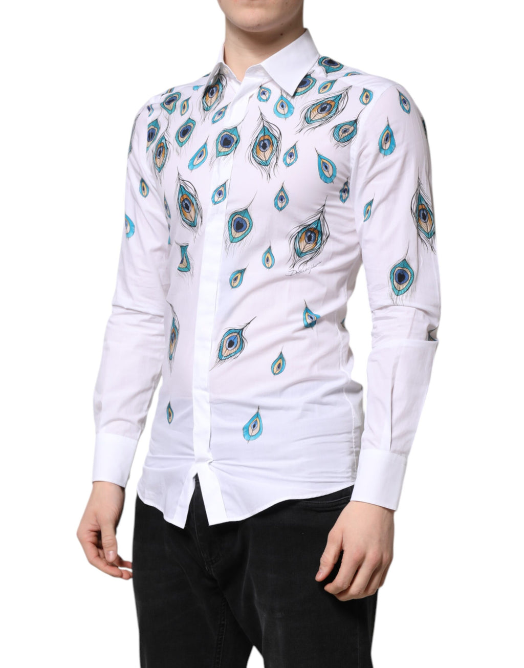 Chemise Dolce & Gabbana en coton blanc avec imprimé plumes doré, élégante et sophistiquée.