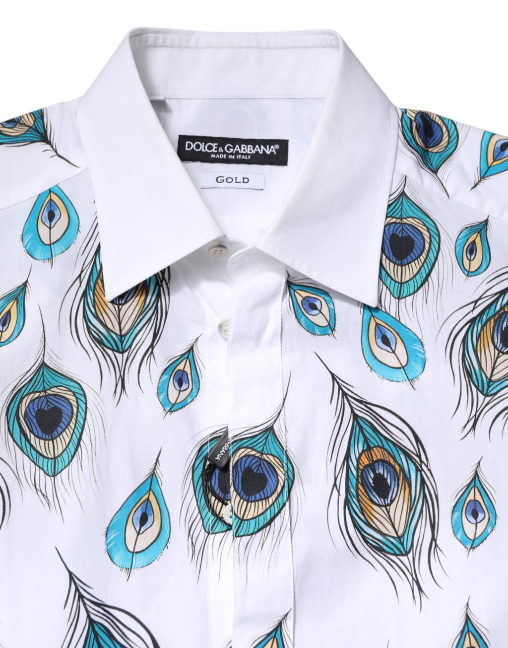 Chemise blanche Dolce & Gabbana en coton avec motif plumes et détails dorés, élégante et sophistiquée.
