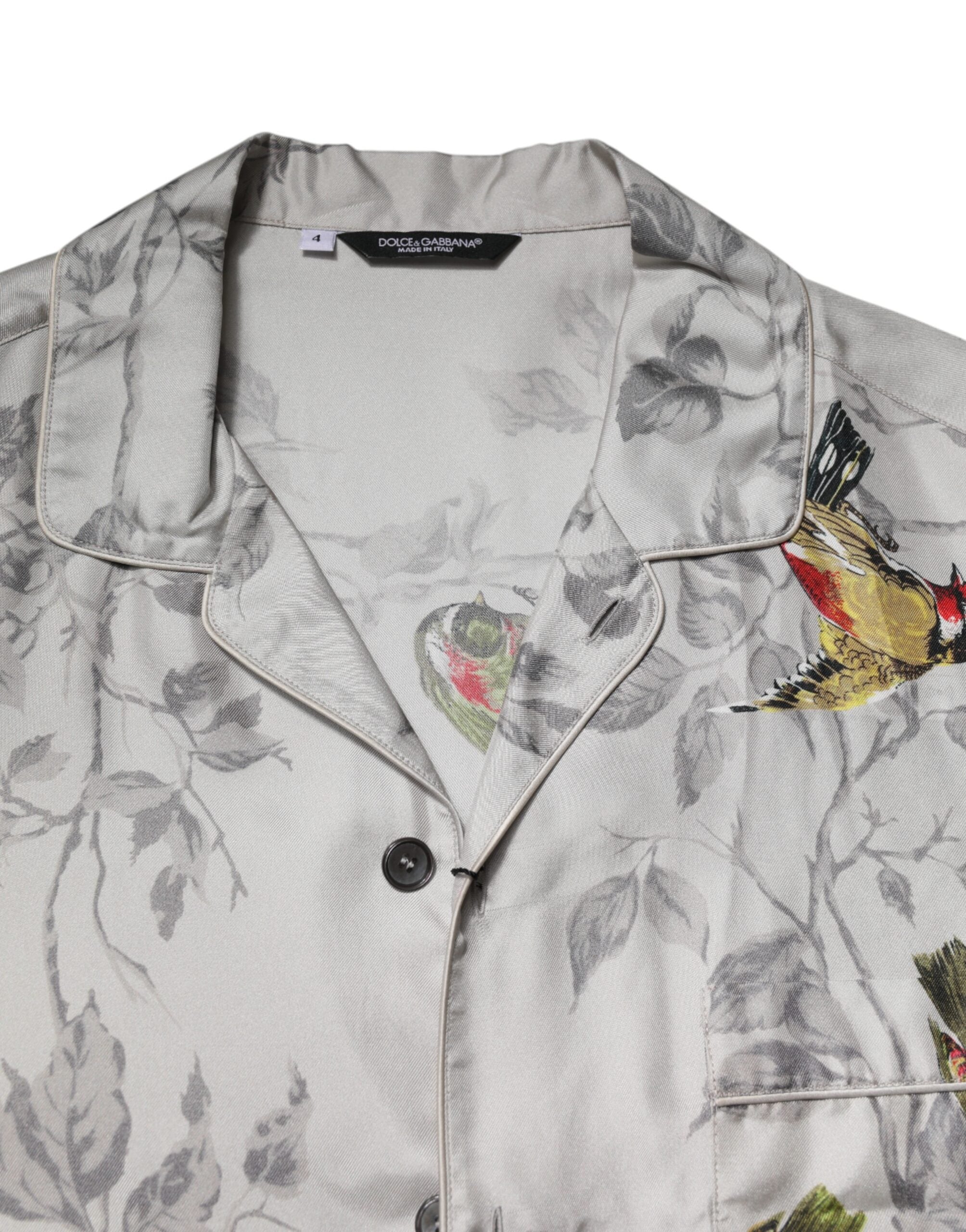 Chemise Dolce & Gabbana en soie multicolore à imprimé, à boutons, affichant un style élégant et sophistiqué.