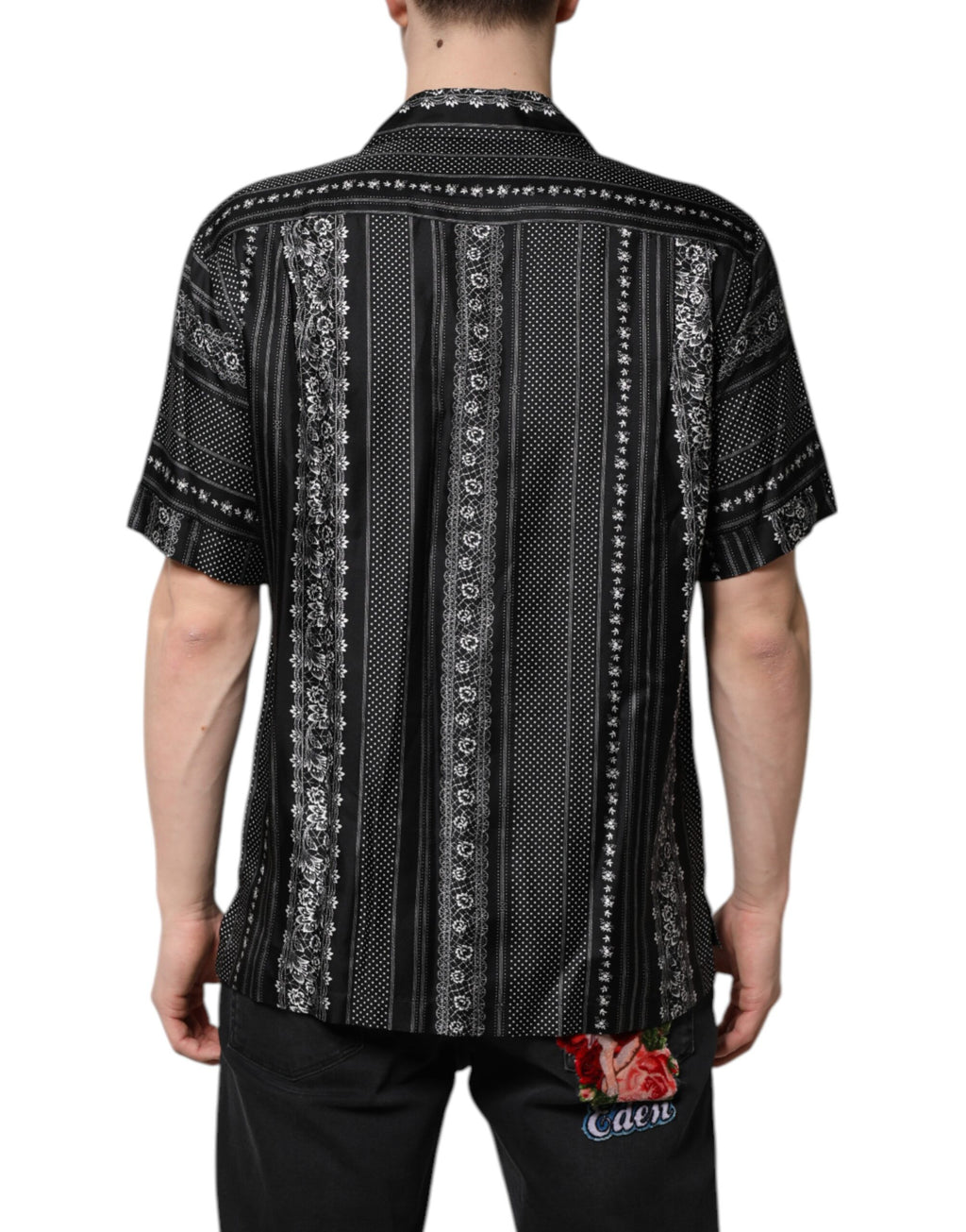 Chemise Dolce & Gabbana en soie noire avec imprimé floral à manches courtes, élégante et sophistiquée.