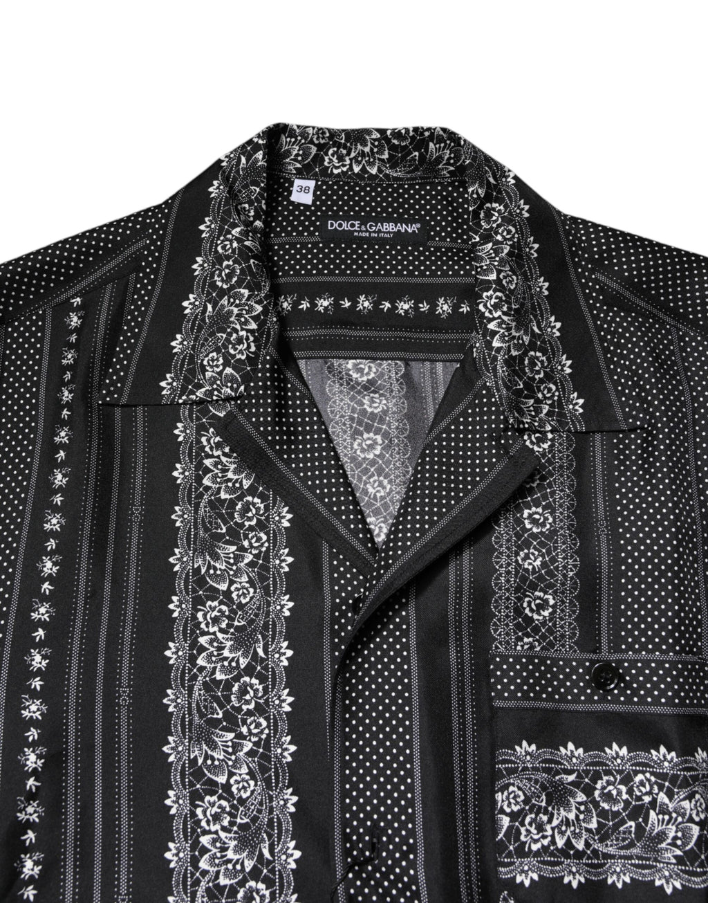 Chemise courte en soie noire Dolce & Gabbana à imprimé floral et manches courtes, élégante et sophistiquée.