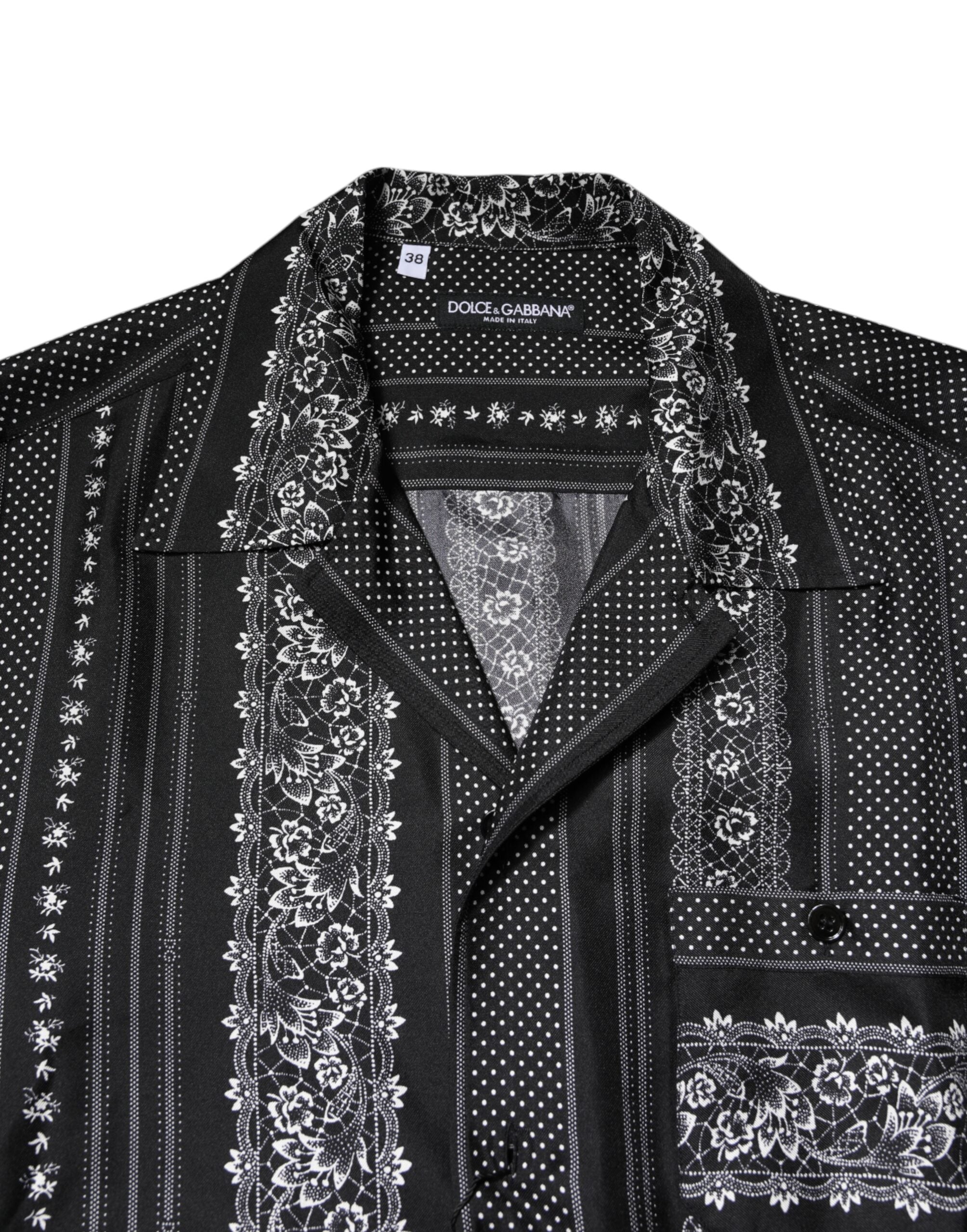 Chemise courte en soie noire Dolce & Gabbana à imprimé floral et manches courtes, élégante et sophistiquée.