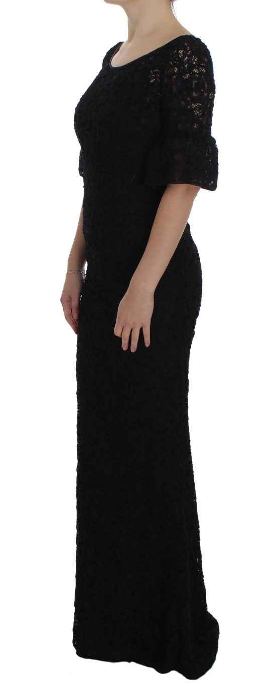 Robe longue noire à fleurs en dentelle Dolce & Gabbana, robe moulante et élégante pour occasions spéciales.