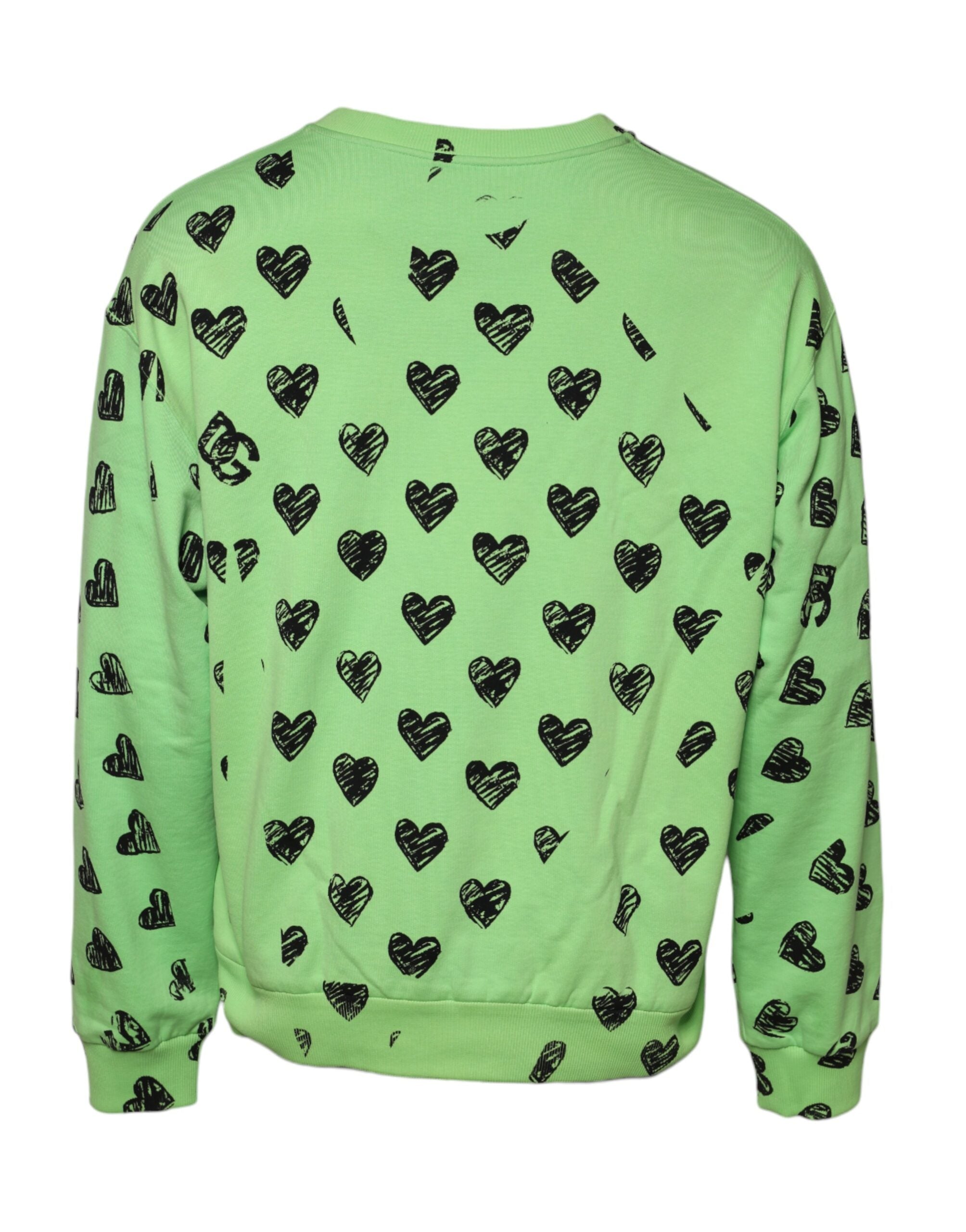 Pull à col rond Dolce & Gabbana avec motif cœur vert, pull-over en maille élégante, visible en gros plan.
