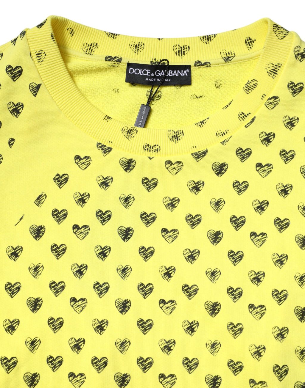 Pull en laine Dolce & Gabbana jaune avec motif cœur, col rond, pour homme, vue de face.