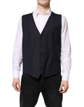 Robe-veste noire en laine Dolce & Gabbana, vêtement formel élégant avec coupe ajustée et détails raffinés.
