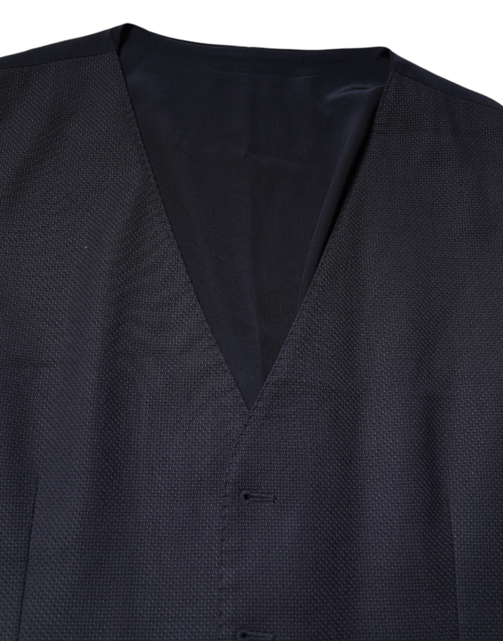 Gilet formel en laine noire Dolce & Gabbana, robe sans manches élégante, détail sophistiqué pour tenue chic et élégante.