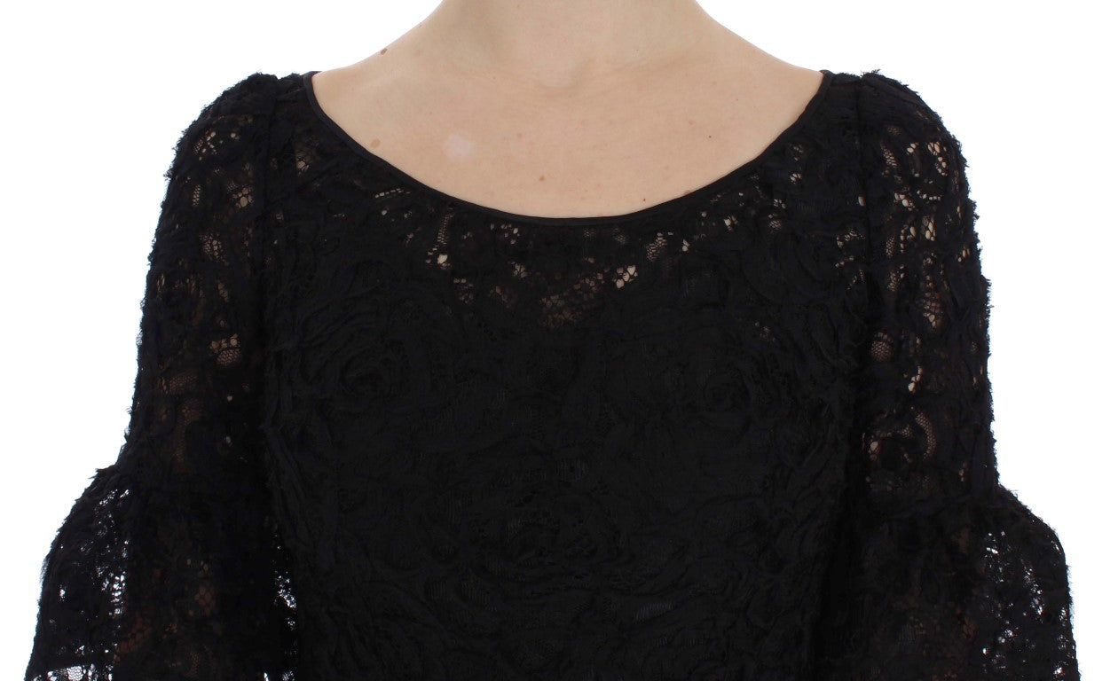 Robe longue moulante Dolce & Gabbana en dentelle noire avec motifs floraux, style bodycon, élégante et sophistiquée.