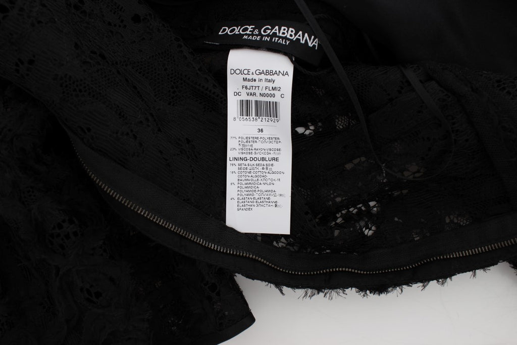 Robe longue moulante Dolce & Gabbana noire en dentelle florale, maxi élégante à coupe ajustée et détails sophistiqués.