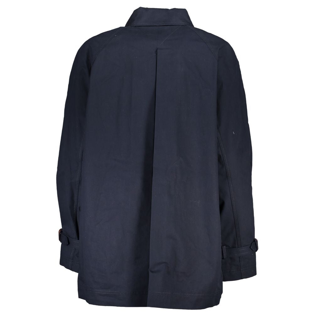 Manteau trench en coton bleu pour femme de la marque Tommy Hilfiger, visible avec détails et boutonnières sur l'image.