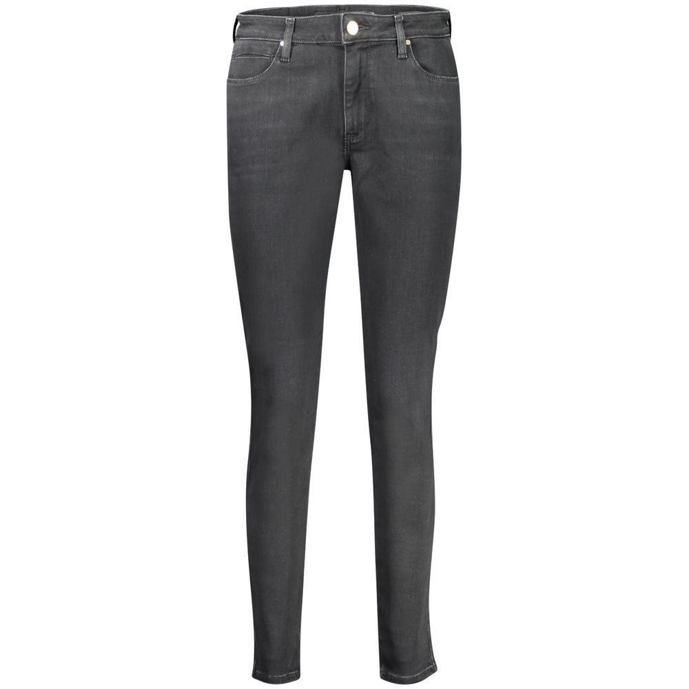 Jeans skinny noirs pour femmes Guess Jeans en coton, coupe ajustée et style moderne visible sur l'image.