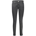 Jeans skinny noirs pour femmes Guess Jeans en coton, coupe ajustée et style moderne visible sur l'image.