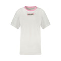 T-shirt blanc pour femmes Guess Jeans en coton, coupe décontractée et logo Guess visible sur le devant.