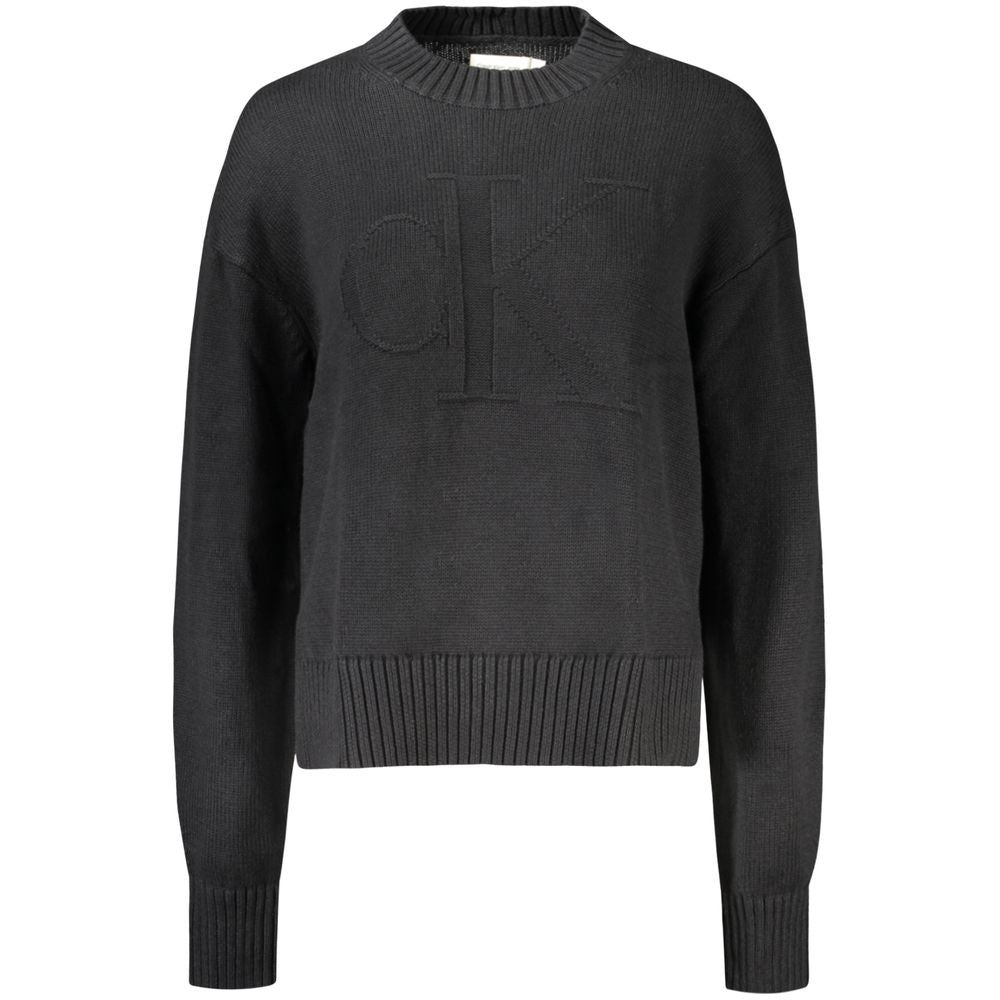 Pull pour femmes en coton noir de la marque Calvin Klein, coupe classique et détails élégants.