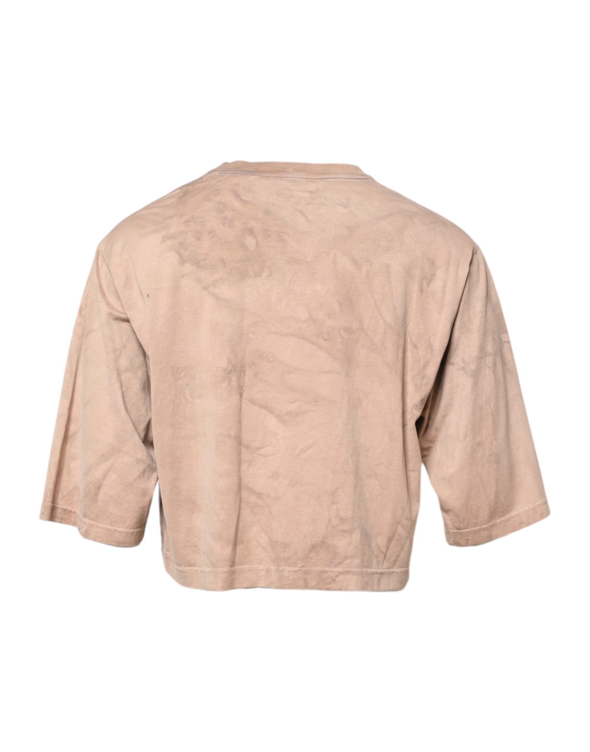 T-shirt cropped beige Dolce & Gabbana avec logo et motif tie-dye, style décontracté et tendance.