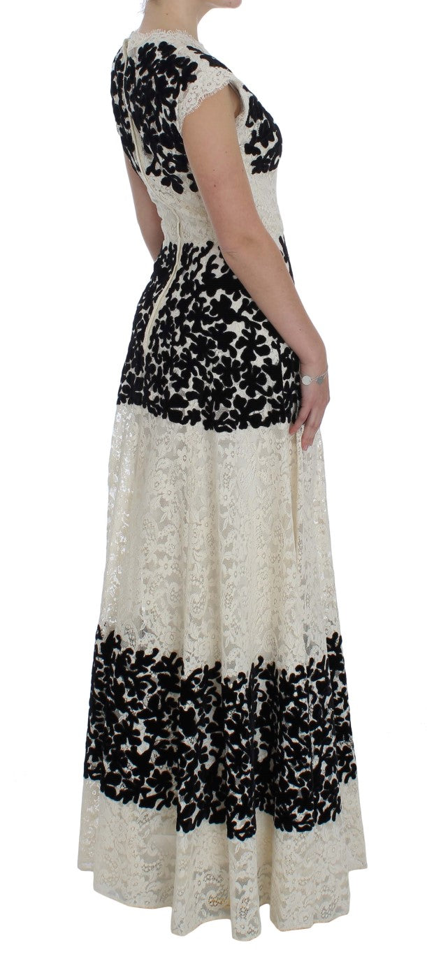 Robe longue maxi Dolce & Gabbana en dentelle florale et ricamo, élégante avec détails sophistiqués pour une allure raffinée.