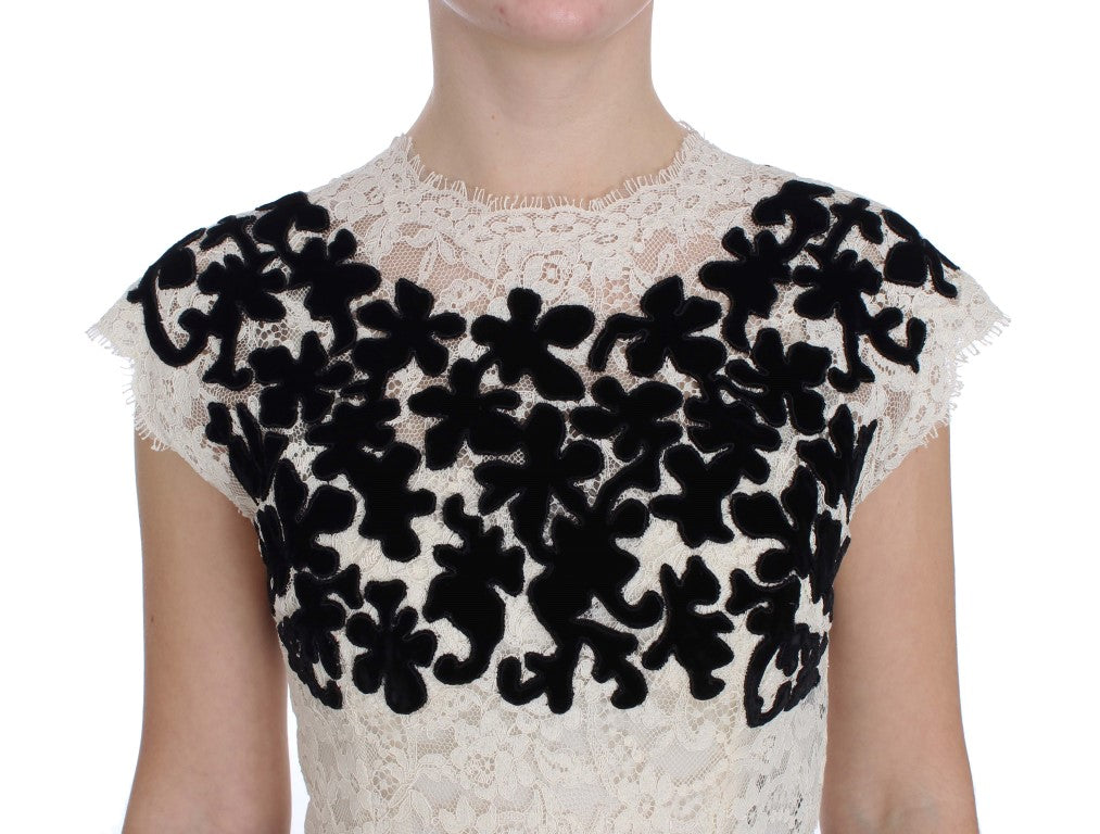 Robe longue Dolce & Gabbana en dentelle florale Ricamo, maxi avec détails élégants et finition raffinée.