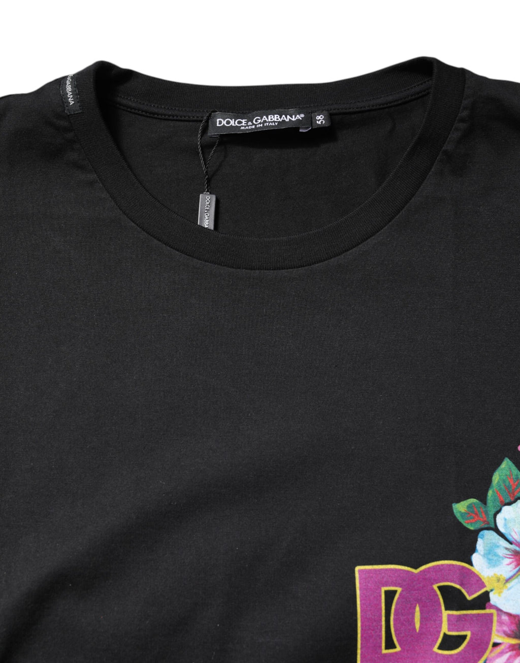 T-shirt à col rond Dolce & Gabbana noir avec imprimé floral DG, style décontracté, visible en gros plan.
