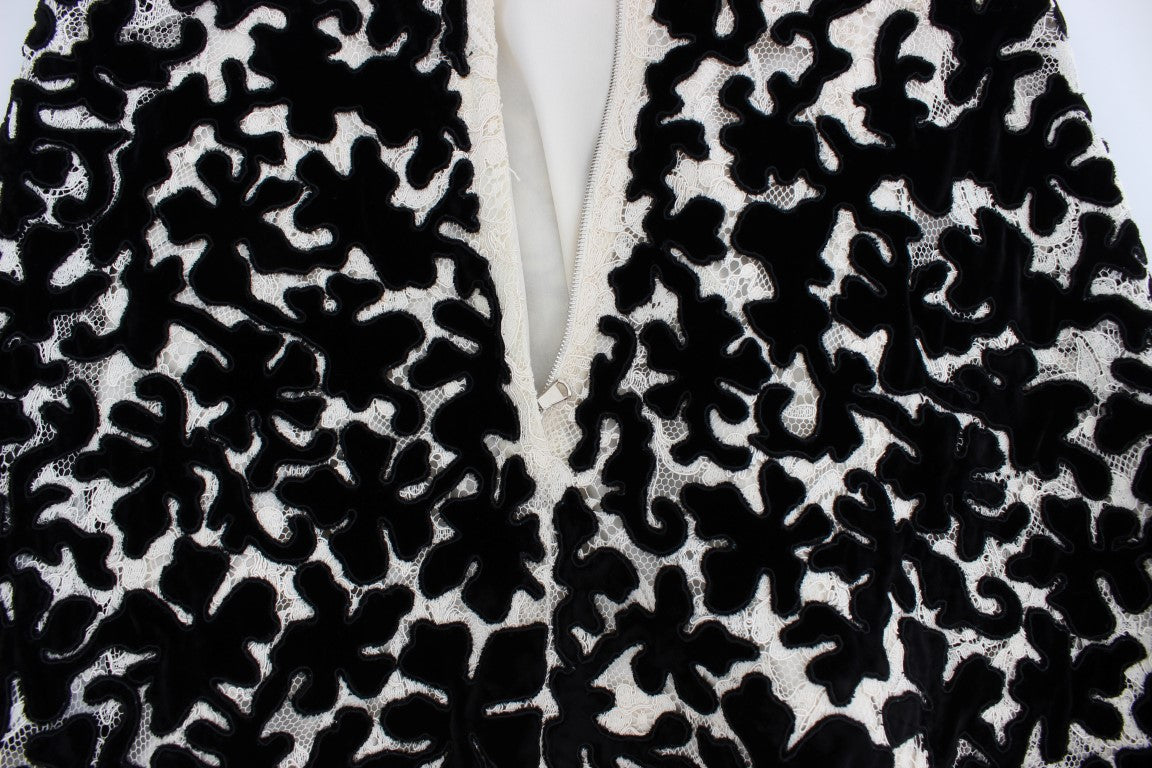 Robe longue maxi Dolce & Gabbana en dentelle florale et ricamo, élégante et raffinée, vue de face.