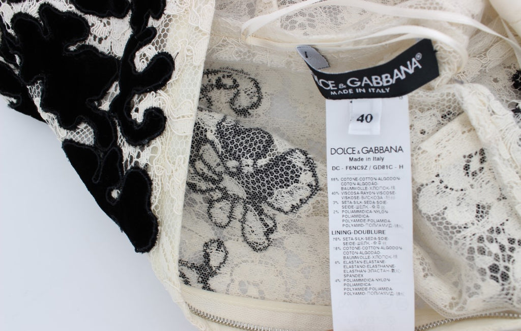 Robe longue Dolce & Gabbana en dentelle florale, ricamo élégant, style maxi, vêtement sophistiqué pour occasion spéciale.