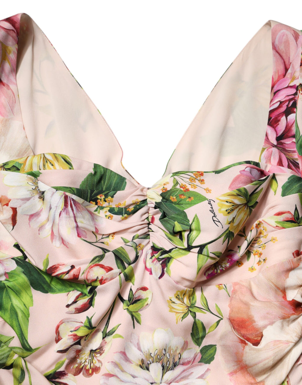 Robe midi en soie rose à fleurs, coupe ajustée et évasée, de la marque Dolce & Gabbana, avec détails floraux élégants.