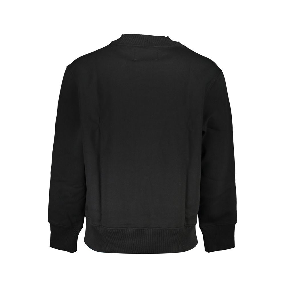 Sweat-shirt homme en coton noir de la marque Calvin Klein, avec logo discret sur la poitrine, porté sur un mannequin.