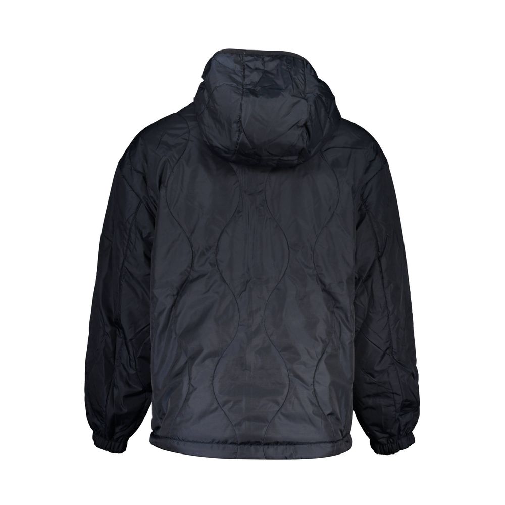 Veste bleue en polyester pour homme de la marque Tommy Hilfiger, coupe moderne avec col et fermeture éclair.