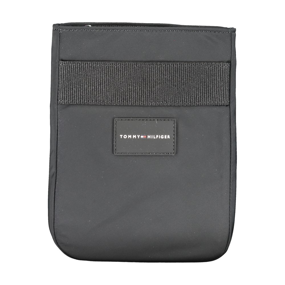 Sac à bandoulière pour homme Tommy Hilfiger en polyester noir, avec poches et logo distinctif, idéal pour un style décontracté.