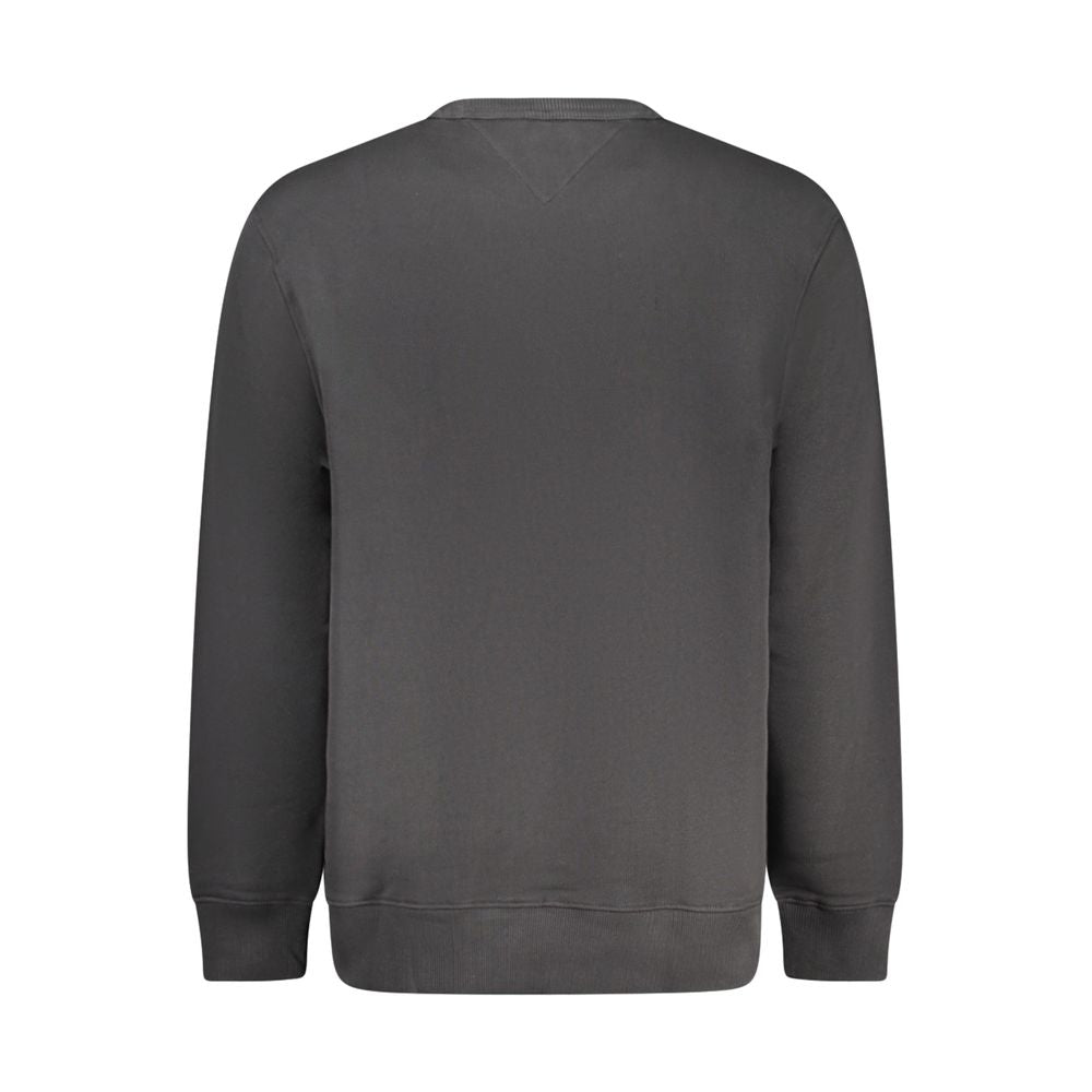 Sweatshirt pour homme en coton noir de la marque Tommy Hilfiger, manches longues et logo discret à l'avant.