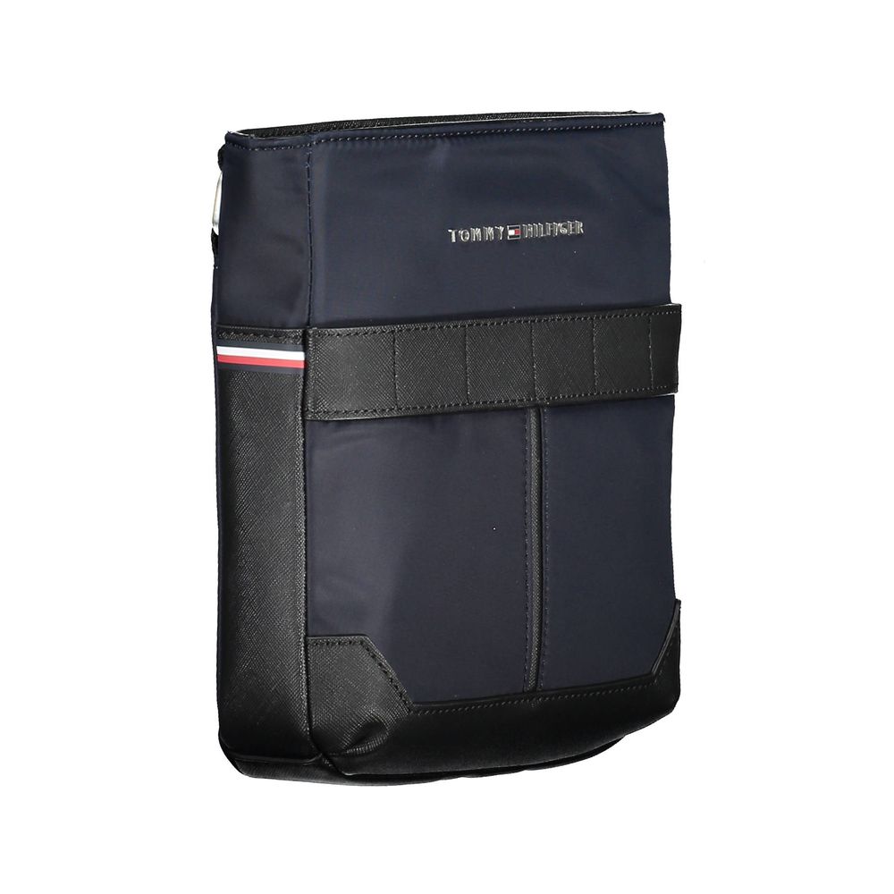 Sacoche homme en polyuréthane bleu Tommy Hilfiger avec bandoulière, détail élégant et moderne.
