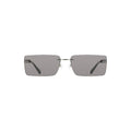Lunettes de soleil pour femmes Calvin Klein noires avec monture en métal, style tendance et élégant.