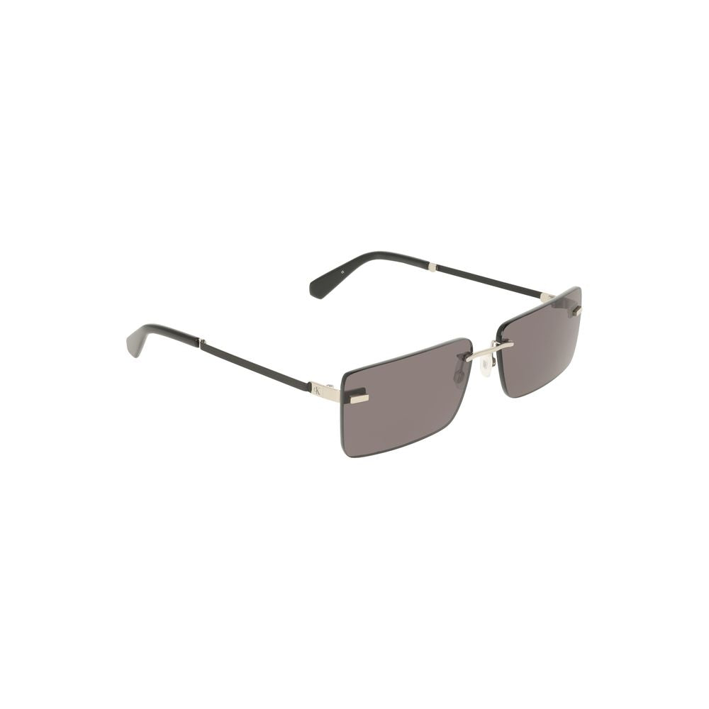 Lunettes de soleil pour femmes Calvin Klein en métal noir, élégantes et modernes, avec monture fine et design sophistiqué.