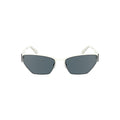 Lunettes de soleil pour femmes Calvin Klein en métal blanc, avec monture élégante et design moderne.