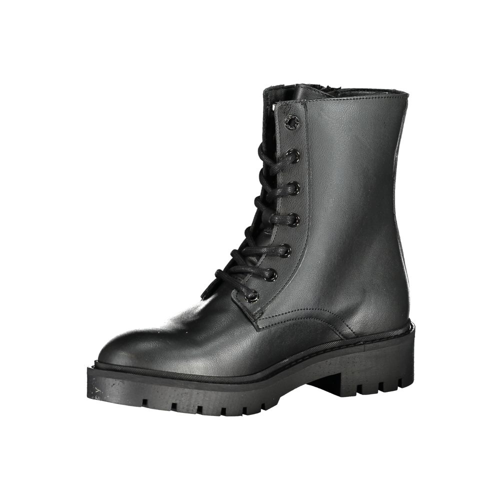 Bottines pour femmes en polyuréthane noir de la marque Calvin Klein, style ankle boot, vue de face.
