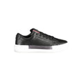 Sneakers pour femmes en cuir noir Tommy Hilfiger, design élégant avec semelle blanche, parfait pour un style décontracté.