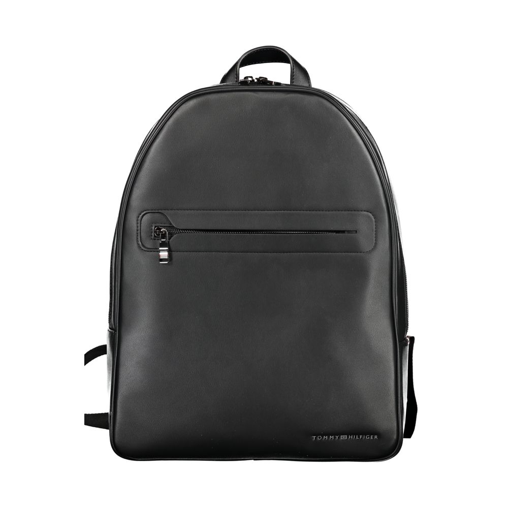 Sac à dos homme Tommy Hilfiger en polyuréthane noir, avec bretelles réglables et logo visible.