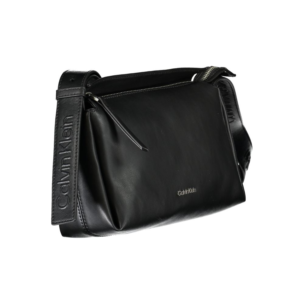 Sac à main noir en polyester pour femmes de la marque Calvin Klein, avec bandoulière et style élégant.