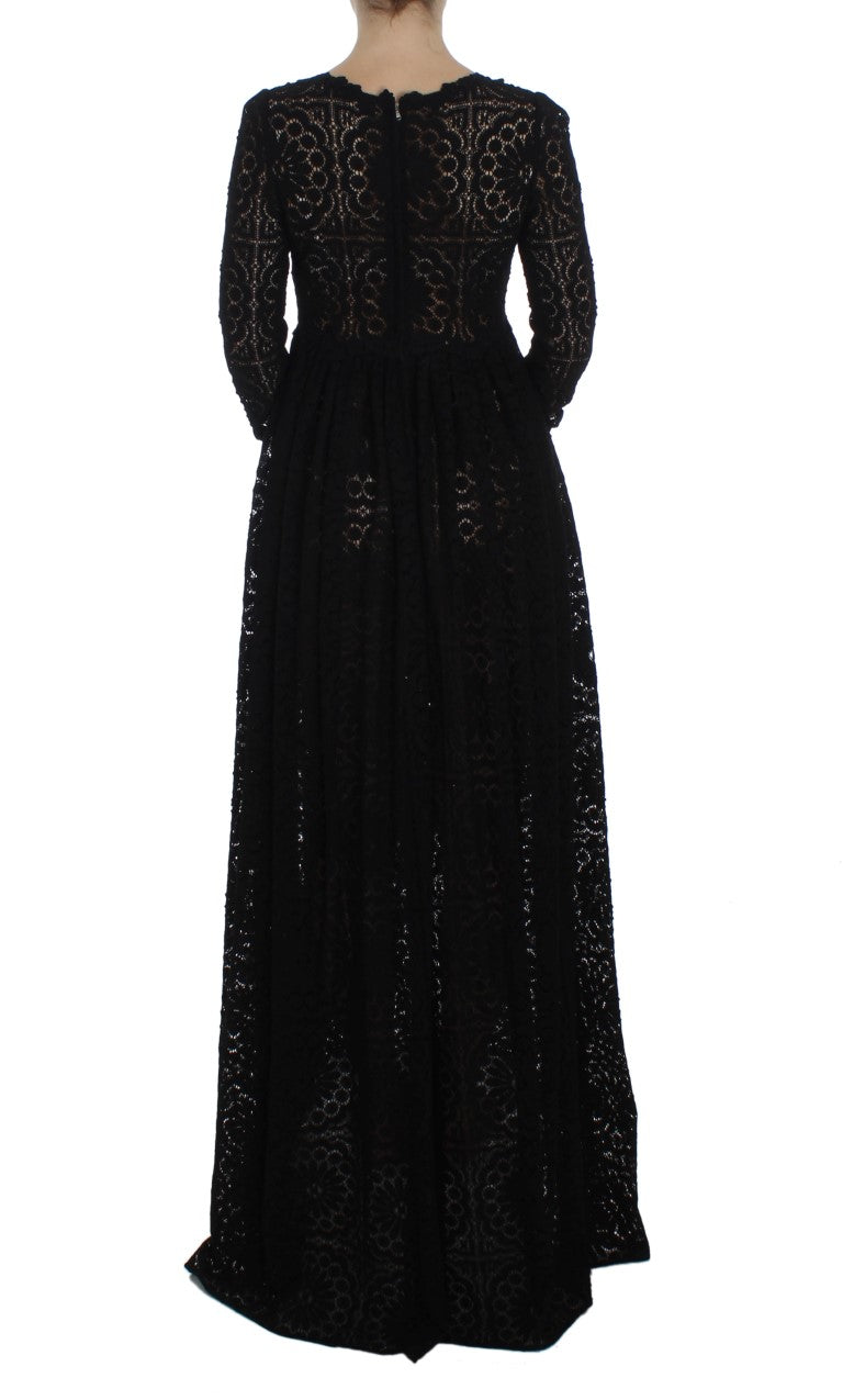 Robe longue maxi en tricot noir Dolce & Gabbana avec broderie Ricamo, élégante et ajustée, portée sur un mannequin.