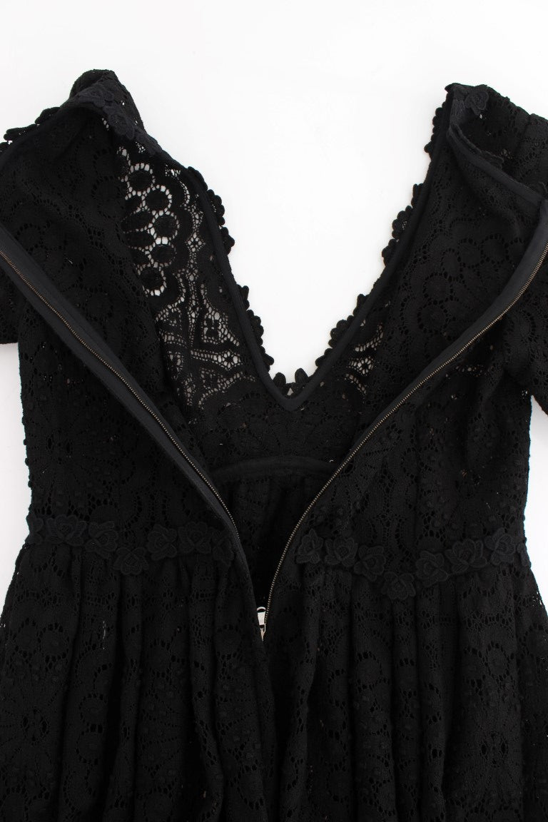 Robe maxi noire en tricot avec broderies Dolce & Gabbana, longueur complète, élégante et sophistiquée.