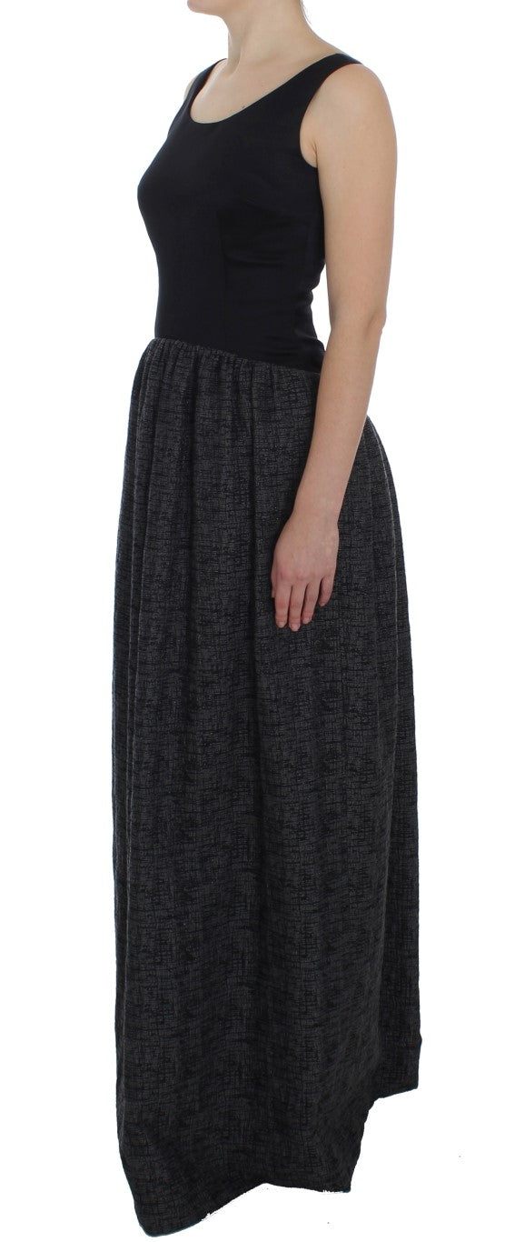 Robe longue noire et grise Dolce & Gabbana, robe fourreau élégante avec détails sophistiqués, portée pour une occasion chic.
