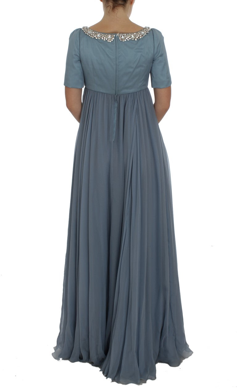 Robe de soirée Dolce & Gabbana en soie bleue avec cristaux, coupe ajustée et élégante pour occasion spéciale.