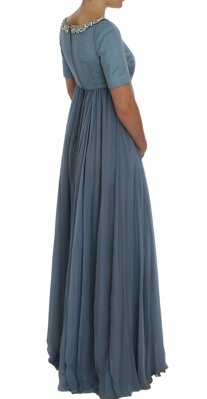 Robe de soirée en soie bleue Dolce & Gabbana avec cristaux, coupe ajustée et élégante pour événements formels.