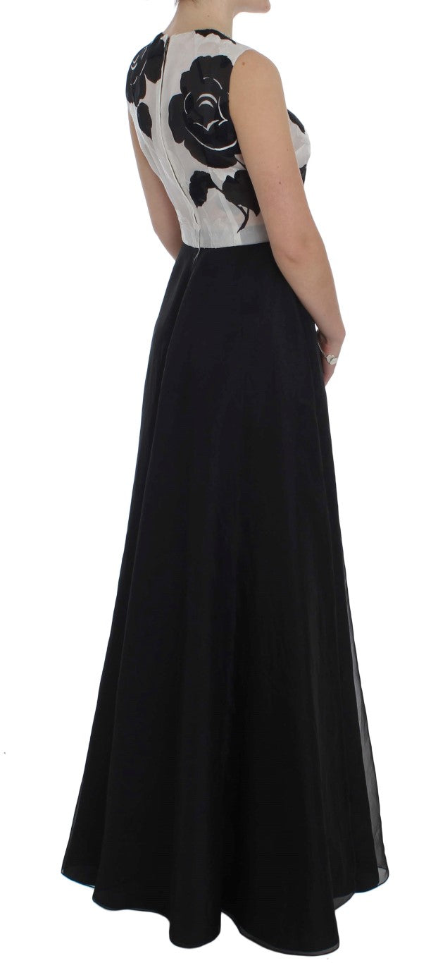 Robe fourreau en soie noire et blanche à fleurs de Dolce & Gabbana, élégante et sophistiquée, avec un design floral.