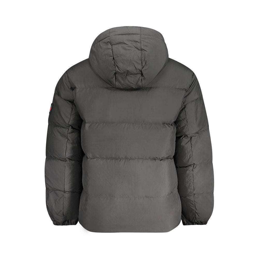 Veste noire en polyester pour homme de la marque Tommy Hilfiger, coupe classique avec fermeture éclair et col montant.