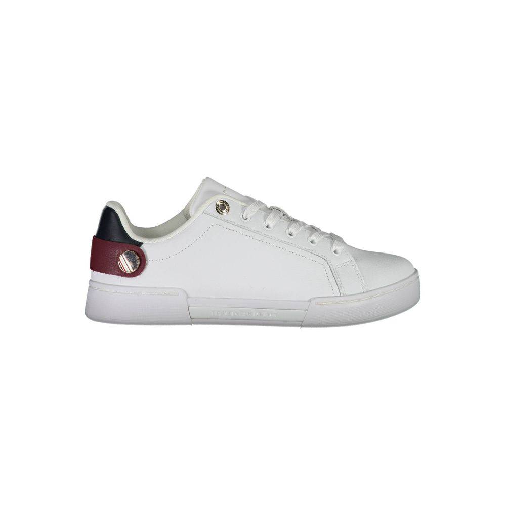 Sneakers en polyuréthane blanches Tommy Hilfiger pour femmes, vue de côté, avec design moderne et semelle blanche.