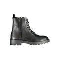 Chaussures bottines noires en polyuréthane pour homme de la marque Calvin Klein, vue de face.